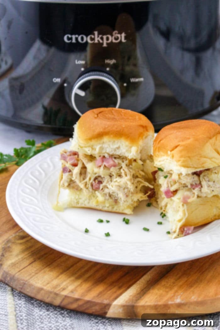 Gourmet Cordon Bleu Chicken Melt 9 A tray of freshly made Chicken Cordon Bleu Sliders on sweet Hawaiian rolls, ready to be served.