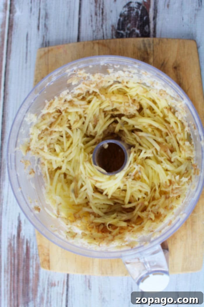 Golden Crispy Air Fryer Latkes 3 Finely shredded potatoes, ready for making latkes