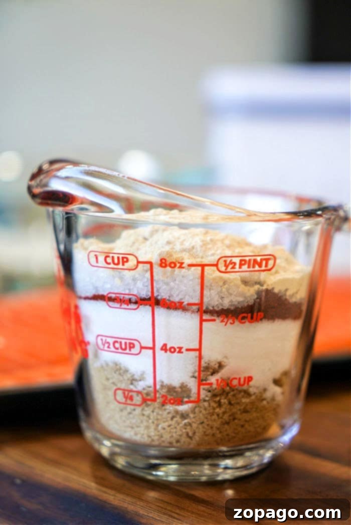 Dry Rub recipe ingredients in separate bowls, ready to be mixed, showcasing the simplicity of this homemade blend.