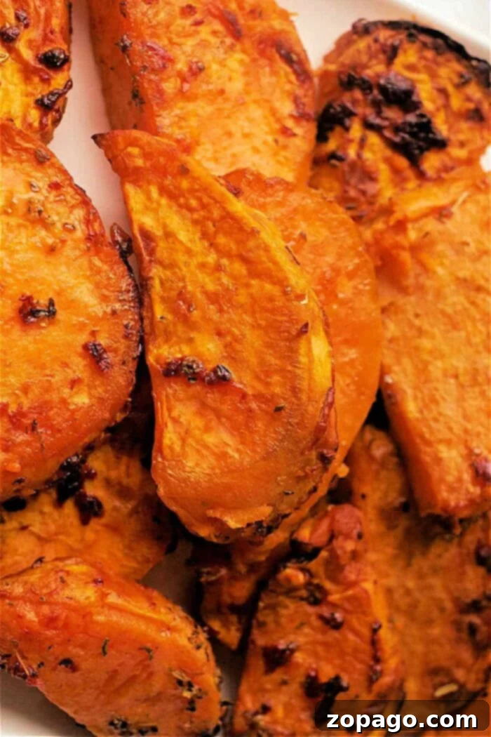 Ultimate Crispy Air Fryer Sweet Potato Wedges 7 Platter of Air Fryer Sweet Potato Steak Fries with dipping sauce.