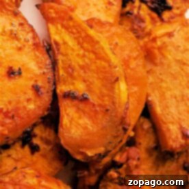 Ultimate Crispy Air Fryer Sweet Potato Wedges 8 Close-up of air fryer sweet potato wedges with crispy edges and seasoning.
