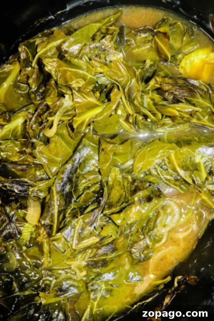 Authentic Southern Slow Cooker Collard Greens 2 Slow Cooker Collard Greens, a vibrant green side dish cooked to tender perfection