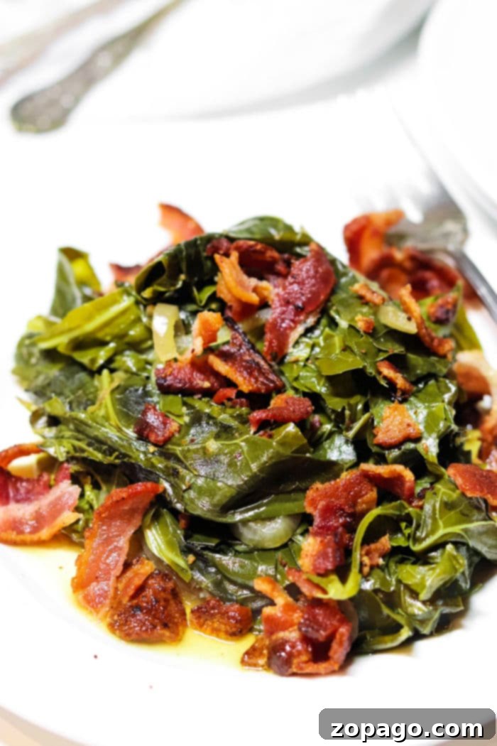 Authentic Southern Slow Cooker Collard Greens 7 How to Cook Collard Greens with Bacon, a finished dish garnished with crispy bacon