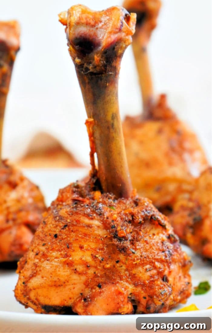 Delicious Lollipop Chicken Drumsticks Recipe 5 Air-fried lollipop chicken drumsticks arranged neatly, showing their crispy texture.