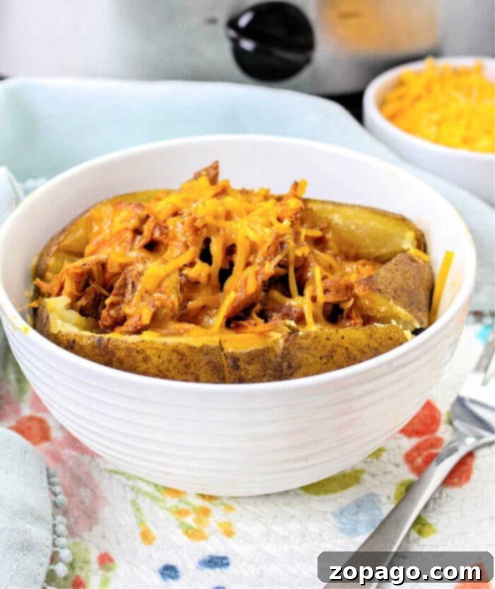 Savory Pulled Pork Baked Potato 2 Delicious Pulled Pork Baked Potato recipe, a hearty comfort food meal.