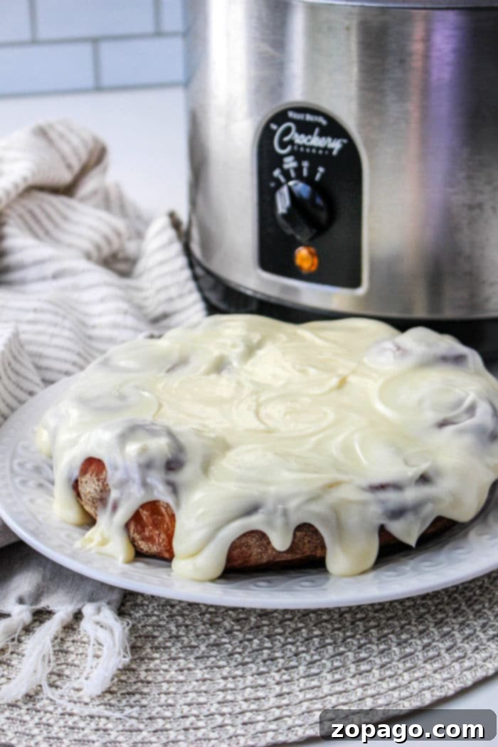 Overnight Slow Cooker Cinnamon Rolls 8 Slow Cooker Apple Cinnamon Rolls with a generous glaze.