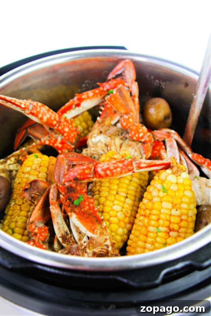 Instant Pot Crab Boil with crab legs, potatoes, and corn