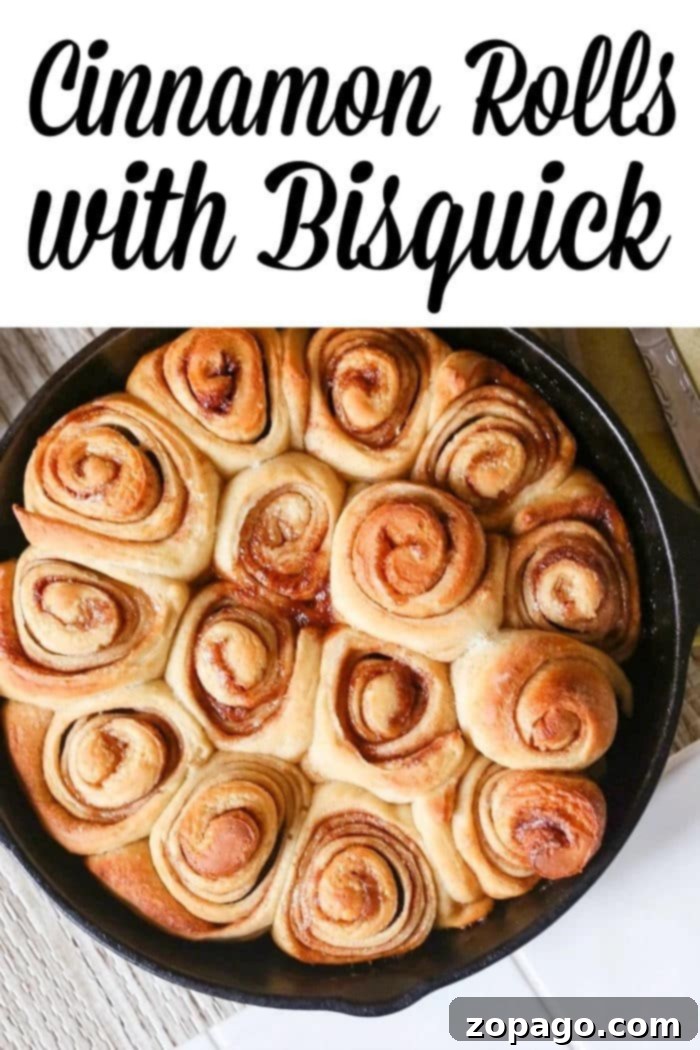 Effortless Bisquick Cinnamon Rolls 6 Close-up of a frosted Bisquick cinnamon roll.