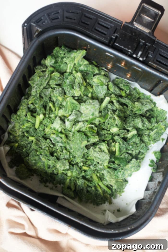 Make Frozen Spinach Taste Amazing 5 A dish of tender, seasoned frozen spinach, ready to be served or incorporated into other recipes.