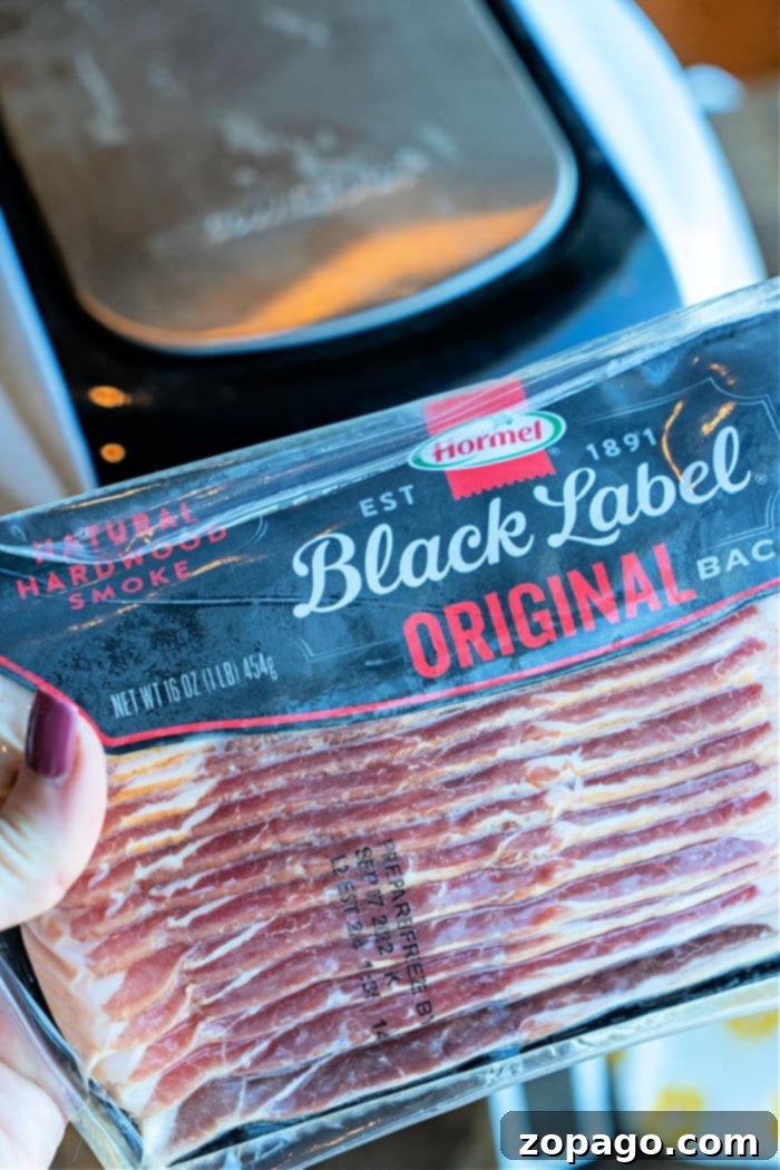 Get Crispy Frozen Bacon in Your Air Fryer 4 Ninja Foodi Frozen Bacon, halved and ready to cook in the air fryer.