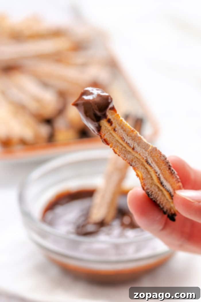 Air Fryer Lava Chocolate Churros 6 Ninja Foodi Churros, perfectly cooked and arranged, ready for a delicious filling.