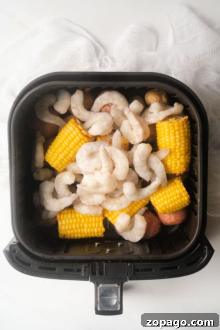 A serving of perfectly cooked air fryer shrimp without breading, showcasing its simplicity and appeal.