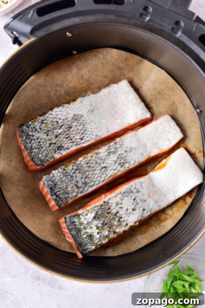 Sticky Air Fryer Teriyaki Salmon 4 Air Fryer Teriyaki Salmon - golden brown fillets ready to be served, showcasing a perfect glaze.