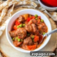 Boricua Beef Guisado 8 A savory bowl of Puerto Rican Beef Stew, garnished and ready to enjoy.