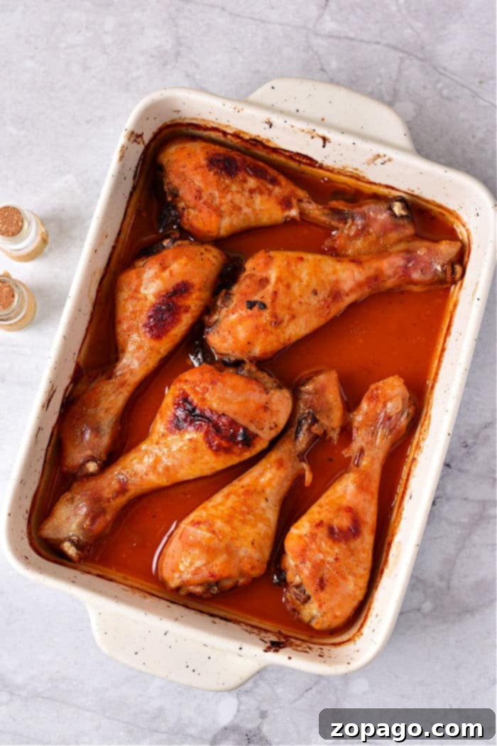 How Long to Roast Chicken Drumsticks at 400F 5 How Long to Bake Chicken Legs in Oven - a close-up of perfectly cooked chicken drumsticks with a golden-brown, crispy skin