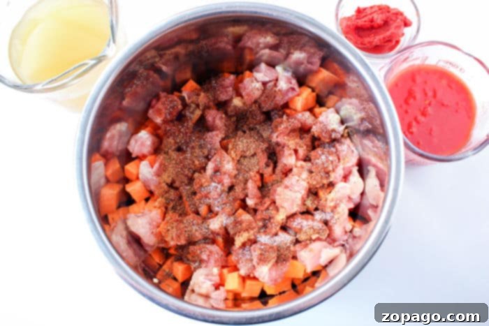 Comforting Sweet Potato Chili 4 A vibrant bowl of Spicy Sweet Potato Chili, garnished with fresh herbs and a hint of red pepper flakes.