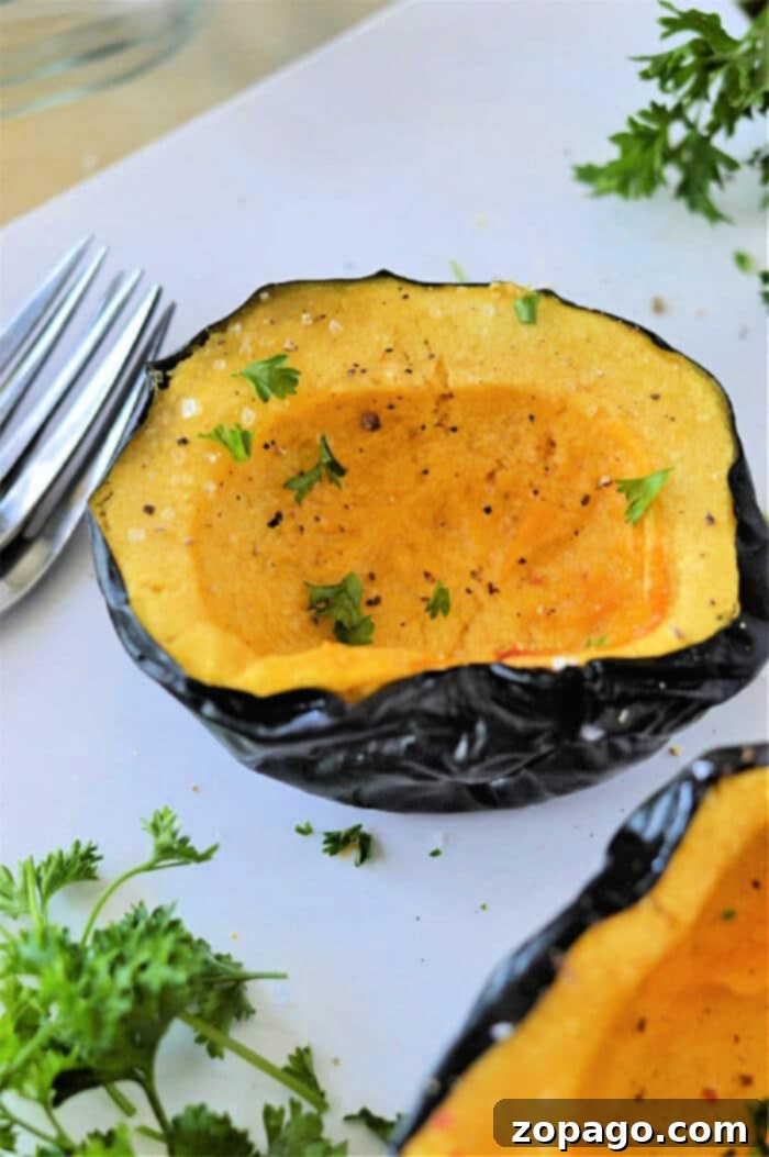 Easy Microwave Acorn Squash 2 Perfectly seasoned microwave acorn squash halves, garnished with fresh parsley, ready to enjoy. Learn how to cook acorn squash in the microwave for a fast, delicious meal.