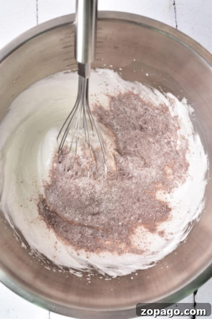 Crisp Chocolate Meringues 4 Chocolate Meringue with Cocoa Powder, showing the mixing stage.