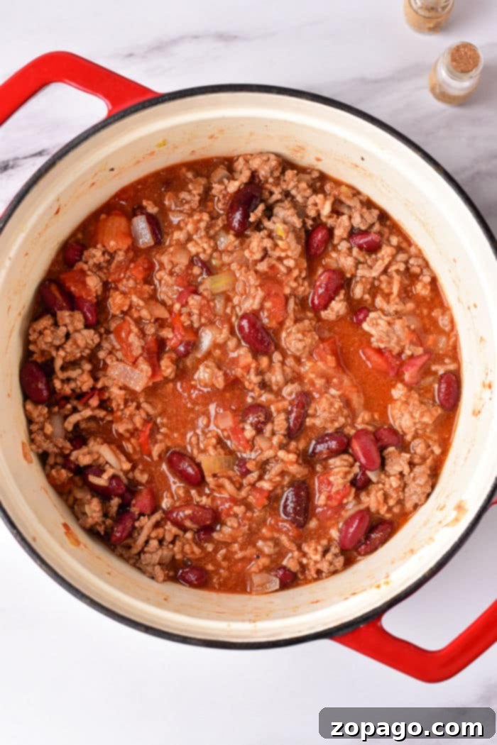 Hearty Dutch Oven Chili 7 Dutch Oven Chili - full pot of chili