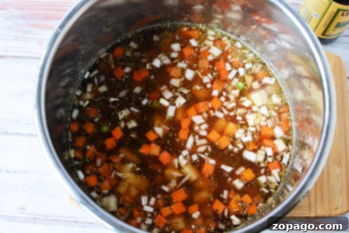 A close-up of a frozen beef roast, emphasizing the question of cooking time from frozen.