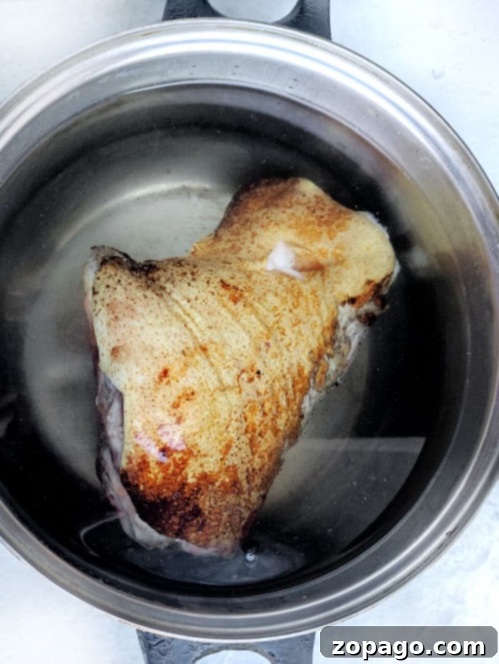 Crispy Pork Knuckle 3 Pork Shank simmering on the stove