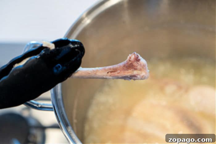 Tender Whole Chicken Boiling Guide 6 How to Tell When Boiled Chicken is Done: The Leg Bone Test