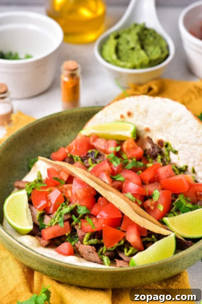 Lengua Tacos 2 Flavorful Cow Tongue Tacos topped with fresh cilantro and salsa