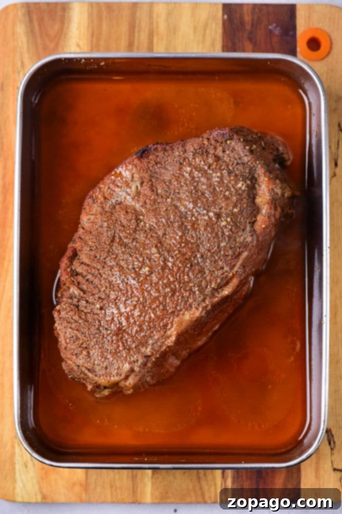 Smoky Chuck Roast Burnt Ends 4 Chuck roast generously coated with a savory and sweet dry rub, ready for its initial bake
