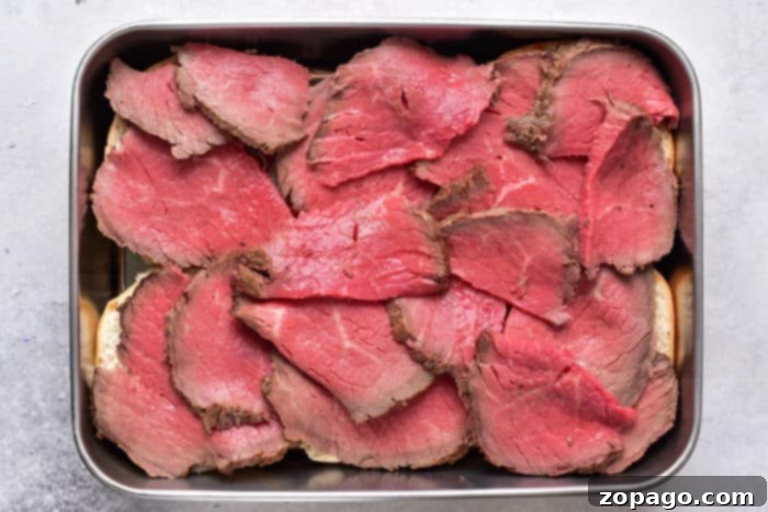 Melt in Your Mouth Tender Roast Beef 7 Baked Roast Beef - Roasted beef slices with herbs.