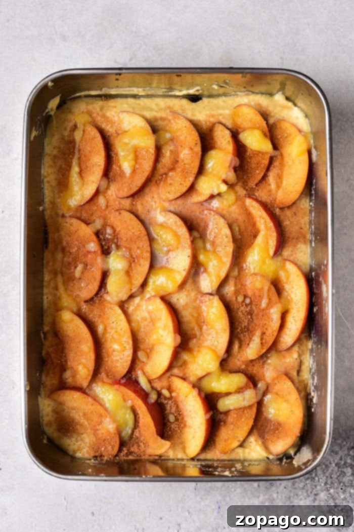 Golden Peach Delight 5 Close-up of a warm peach upside down cake with caramelized peaches