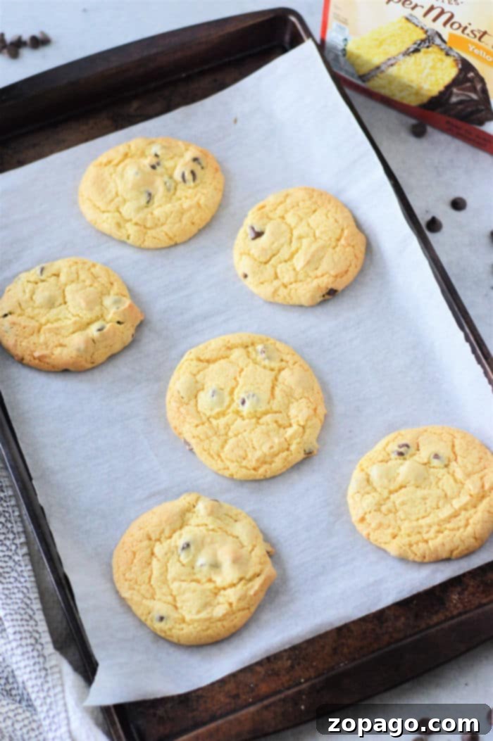 Golden Chocolate Chip Cake Mix Cookies 5 Yellow Cake Mix Chocolate Chip Cookies - Stacked and ready to eat.