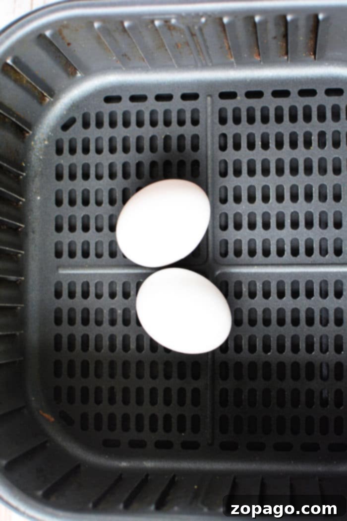 Perfect Air Fryer Soft Boiled Eggs 3 Soft Boiled Eggs in Air Fryer with a runny yolk