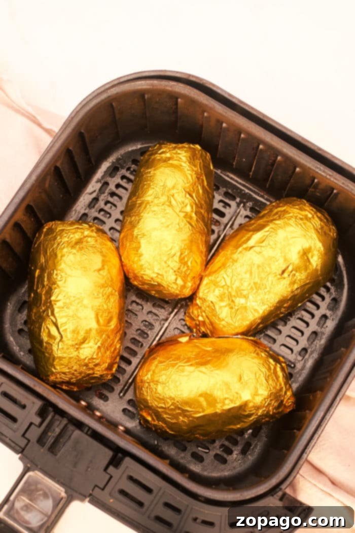 Air Fryer Reheat for Perfect Baked Potatoes 3 Reheat Baked Potato in Air Fryer with crispy skin