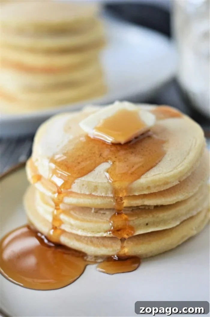 No Baking Powder Pancakes 2 Stack of fluffy pancakes without baking powder, ready for breakfast.