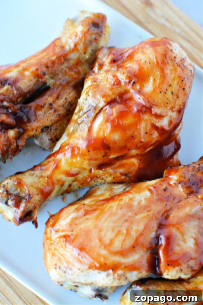 Crispy Oven Butterflied Chicken Legs 2 Butterflied Chicken Legs laid out on a baking sheet, ready for seasoning and cooking.
