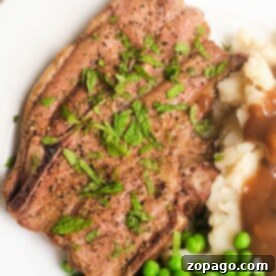 How to Cook Lamb Shoulder Chops - a visual of the delicious final dish, garnished and ready to serve.