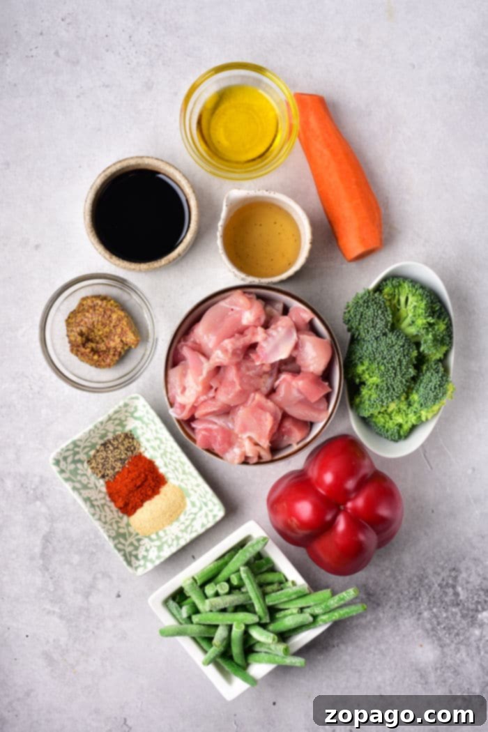 Succulent Chicken Thigh Stir-Fry 3 Healthy Chicken Thigh Stir Fry with fresh ingredients arranged before cooking