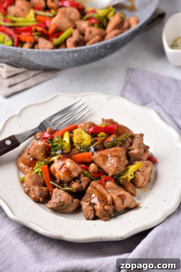 Succulent Chicken Thigh Stir-Fry 7 Chinese-inspired chicken thigh stir fry ready to serve with steamed rice