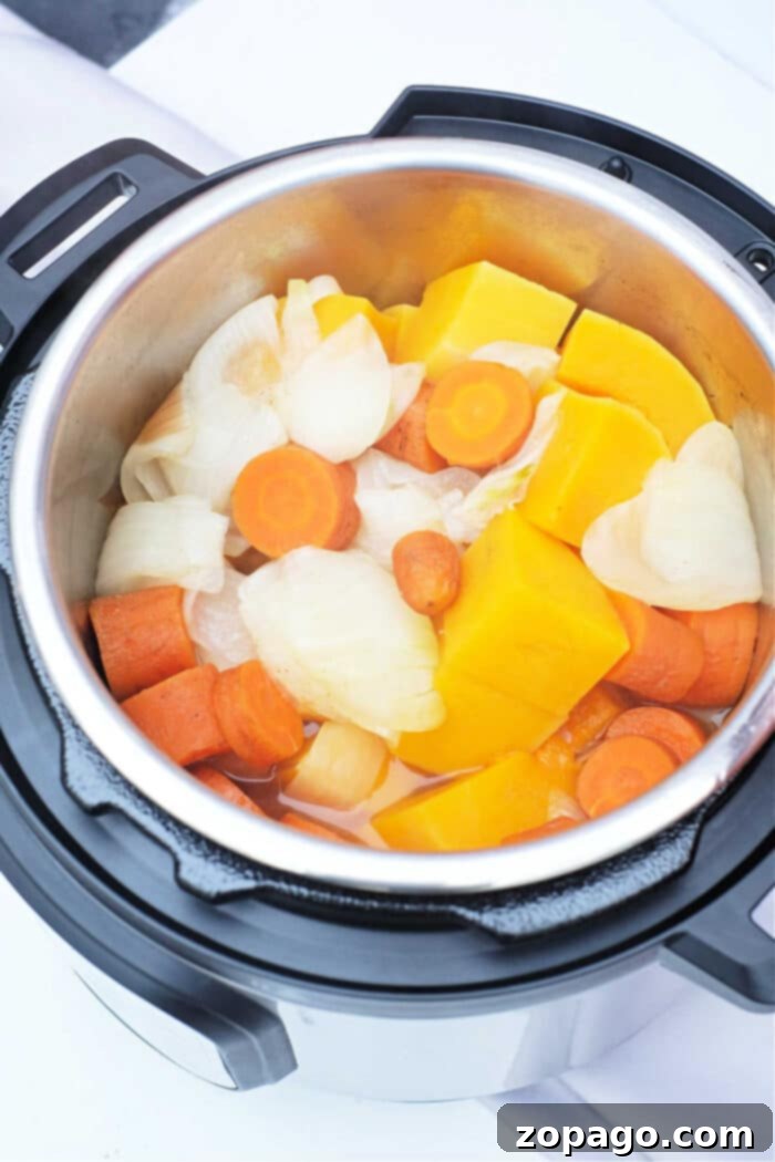 Velvety Kabocha Squash Soup 7 Instant Pot Kabocha Squash Soup being prepared, showcasing efficiency.