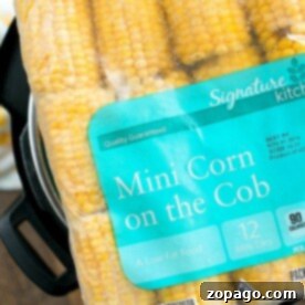 Perfectly Cooked Frozen Corn on the Cob Every Time 8 How to cook frozen corn on the cob, featuring a golden ear of corn