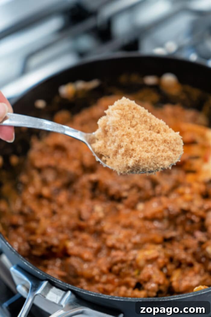 Sloppy Joe Sidekick Dishes 4 A spoonful of brown sugar held over a pot of simmering ground meat, the irresistible aroma beckons as the perfect prelude to delectable Sloppy Joes.