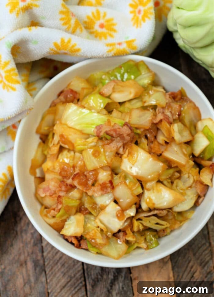 Rustic Cabbage and Bacon 6 A close-up of a delicious bacon and cabbage recipe, showcasing the golden brown bacon and perfectly tender cabbage, ready for a meal.
