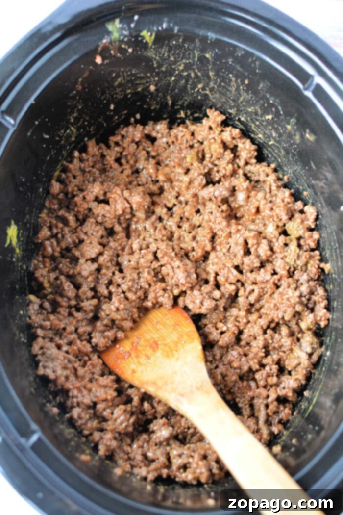 Effortless Slow Cooker Sloppy Joes 5 Overhead view of Slow Cooker Sloppy Joes in a pot, ready to be served.
