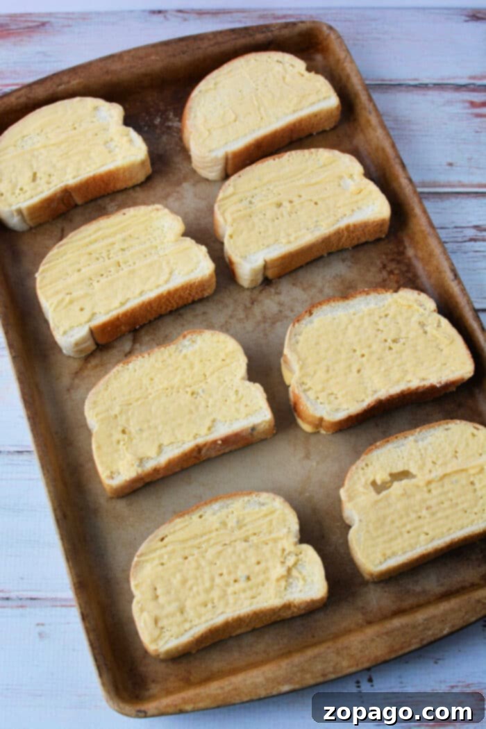 Ultimate Texas Toast Sloppy Joes 4 Texas Toast recipe, prepared on a baking sheet, ready for the sloppy joe topping.