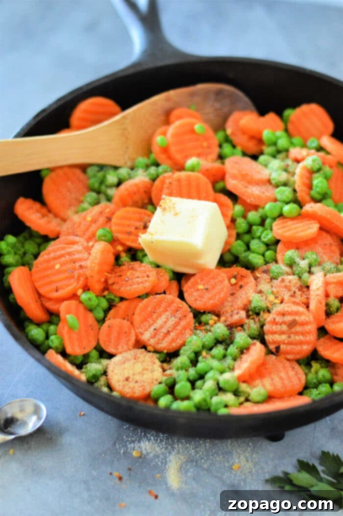 Mastering Frozen Peas and Carrots 5 Deliciously seasoned frozen peas and carrots ready to serve in a white bowl, illustrating a perfect easy side dish.