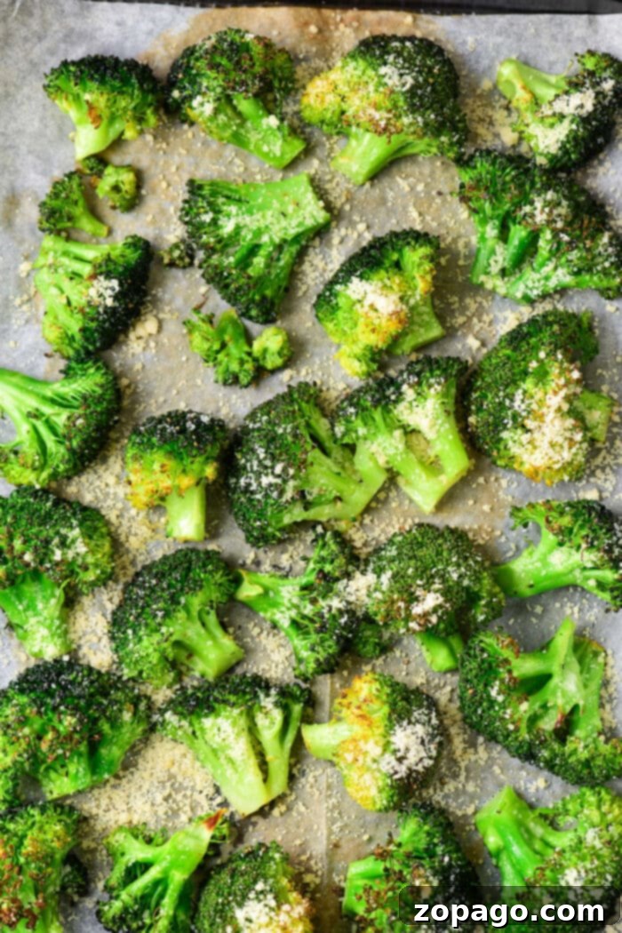Perfectly Baked Frozen Broccoli 8 Close-up of perfectly roasted frozen broccoli florets, showcasing their vibrant green color and crispy, caramelized edges.