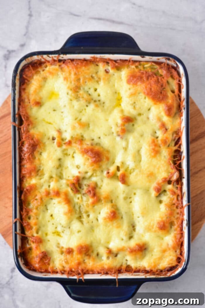 No-Boil Ravioli Lasagna 6 Delicious baked frozen ravioli casserole in a serving dish.