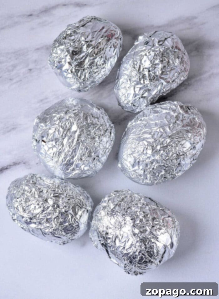 Foil Wrapped Baked Potatoes 2 baked potatoes at 375 in foil