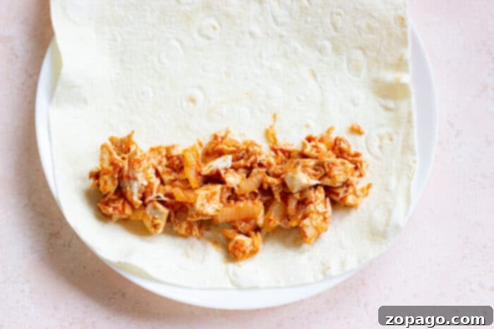 Enchilada Cooking Times 4 Delicious homemade chicken enchiladas in a baking dish, ready to serve