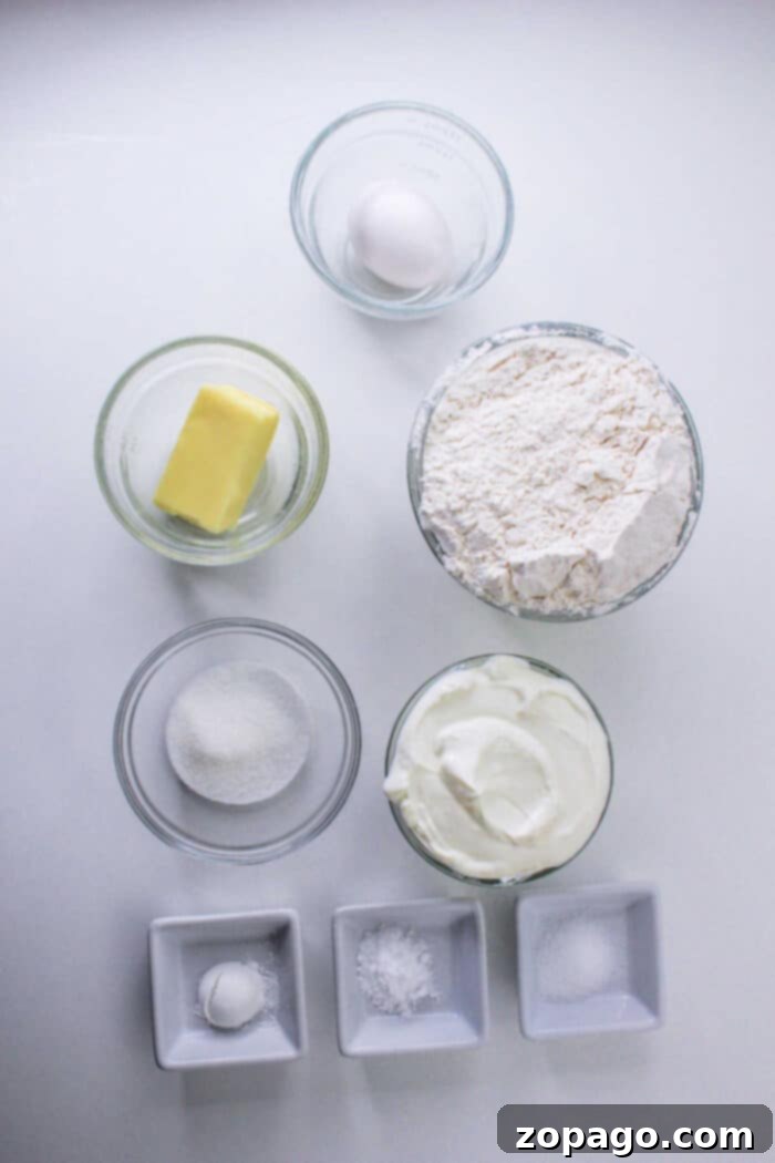 Hardees Copycat Biscuit Recipe 3 Hardee's biscuit ingredients laid out on a wooden surface, ready for mixing.